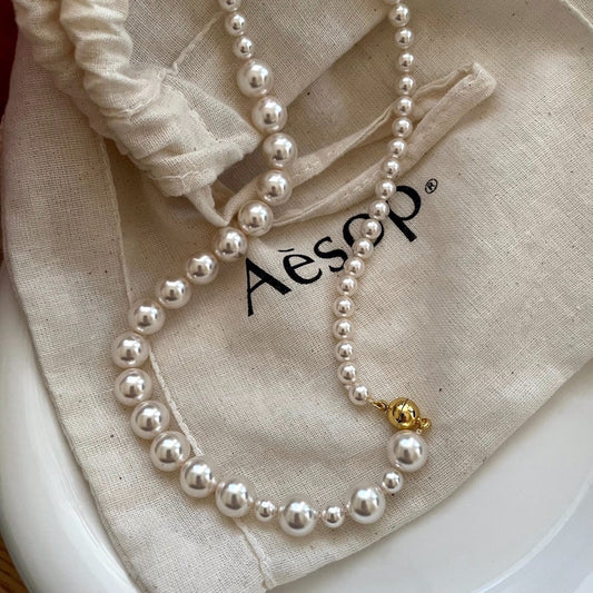 Abella Asymmetric Gradient Pearl Necklace Yellmok